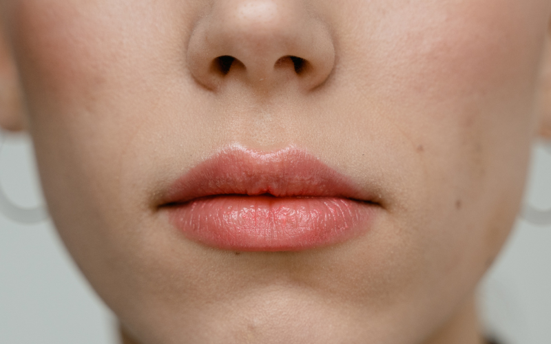 Healing process shown in lip tattoo before and after images
